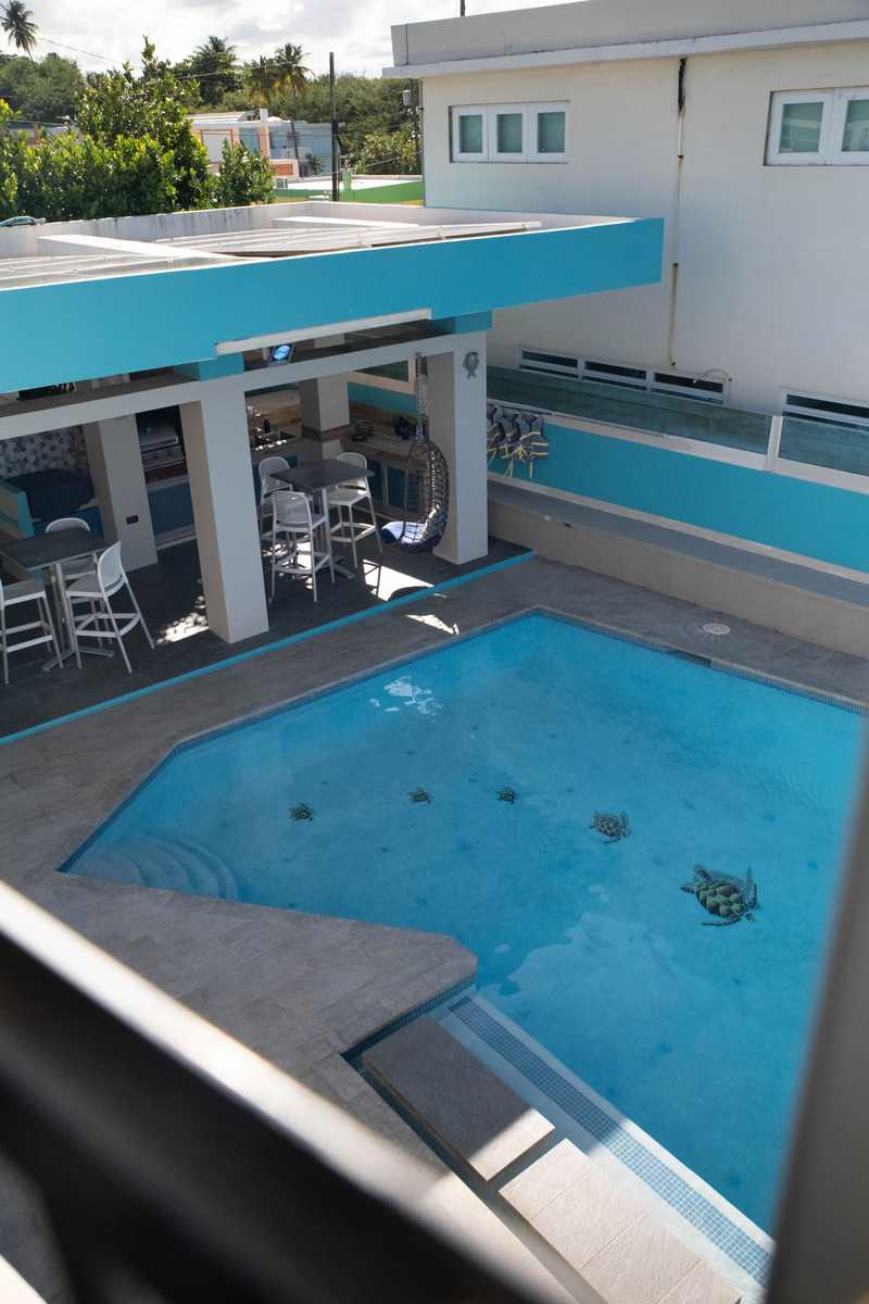 Sheltered courtyard pool in bright daylight